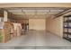 Well-organized two car garage with plenty of built-in storage cabinets and a clean epoxy floor at 1956 E Calle De Caballos --, Tempe, AZ 85284