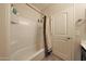 Bathroom featuring a shower and bathtub with sliding door at 20545 W Terrace Ln, Buckeye, AZ 85396