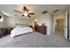 Serene bedroom with plush carpeting, neutral tones, and ample space for relaxation and rest at 20545 W Terrace Ln, Buckeye, AZ 85396