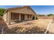 Spacious backyard featuring a patio and low-maintenance rock landscaping at 20895 E Via Del Rancho Rd, Queen Creek, AZ 85142