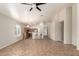 Spacious living area with tile floors, open to the kitchen, offering lots of natural light at 20895 E Via Del Rancho Rd, Queen Creek, AZ 85142