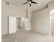 Spacious main bedroom with attached ensuite bathroom and multiple closets at 20895 E Via Del Rancho Rd, Queen Creek, AZ 85142