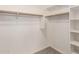 Walk-in closet with ample shelving and storage at 20895 E Via Del Rancho Rd, Queen Creek, AZ 85142