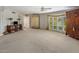 Expansive main bedroom with carpet flooring, ample natural light, and ensuite access at 211 W Kaler Dr, Phoenix, AZ 85021