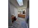 Bathroom with double vanity sinks, a walk-in shower and a skylight at 2121 N Center St # 131, Mesa, AZ 85201