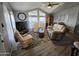 Comfortable living room with vaulted ceilings, large windows, and stylish furnishings for a relaxing atmosphere at 2121 N Center St # 131, Mesa, AZ 85201