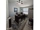 Bright office area with a computer desk, and office chair at 2121 N Center St # 131, Mesa, AZ 85201