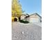 Charming single-story home featuring a low-maintenance desert landscape and attached two-car garage at 22951 W Loma Linda Blvd, Buckeye, AZ 85326