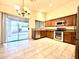 This kitchen boasts stainless appliances, lots of cabinet space, and a sliding glass door to the backyard at 22951 W Loma Linda Blvd, Buckeye, AZ 85326
