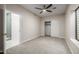 Bedroom with ceiling fan and direct access to a bath at 2743 E Virginia St, Gilbert, AZ 85296