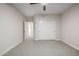 Bedroom featuring sliding closet doors and neutral carpet at 2743 E Virginia St, Gilbert, AZ 85296