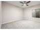 This bedroom has a window and neutral colored walls at 2743 E Virginia St, Gilbert, AZ 85296