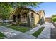 Charming home with arched porch, manicured lawn, and inviting curb appeal at 2743 E Virginia St, Gilbert, AZ 85296