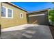 Home exterior featuring a neutral color scheme and a two car garage at 2743 E Virginia St, Gilbert, AZ 85296