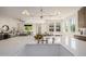 Gourmet kitchen featuring a large island with a sink and view into dining and living area at 2743 E Virginia St, Gilbert, AZ 85296