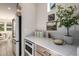 Elegant kitchen counter featuring modern stainless steel appliances and decorative accents at 2743 E Virginia St, Gilbert, AZ 85296