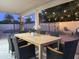 Backyard featuring an outdoor dining area, a firepit and swimming pool at 2753 E Aster Dr, Phoenix, AZ 85032