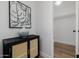 Well decorated room with art and small modern black and gold cabinet at 2753 E Aster Dr, Phoenix, AZ 85032