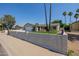 Charming single-story home with well-manicured front yard and palm trees at 2753 E Aster Dr, Phoenix, AZ 85032