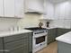 Charming kitchen features updated cabinetry and stainless steel range at 2753 E Aster Dr, Phoenix, AZ 85032
