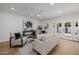 Inviting living room with neutral decor, modern art, and ample natural light at 2753 E Aster Dr, Phoenix, AZ 85032