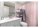 Cozy bathroom with a single sink vanity and shower curtain at 3646 N 67Th Ave # 29, Phoenix, AZ 85033
