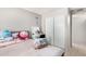 Comfortable bedroom with a neutral color palette and sliding closet doors at 3646 N 67Th Ave # 29, Phoenix, AZ 85033