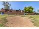 Exterior view showcases well-maintained buildings and communal outdoor space with bench seating at 3646 N 67Th Ave # 29, Phoenix, AZ 85033
