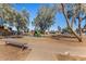 Includes a playground with bench seating and mature trees, enhancing the community at 3646 N 67Th Ave # 29, Phoenix, AZ 85033