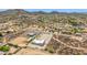 Aerial view highlighting the property's location near other houses and its proximity to a local horse arena at 38415 N 25Th Ave, Phoenix, AZ 85086