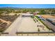 This aerial view showcases the property's spacious lot with detached garage and desert landscaping at 38415 N 25Th Ave, Phoenix, AZ 85086