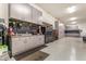 Well-organized garage with full wall of custom gray cabinets and work area for projects at 38415 N 25Th Ave, Phoenix, AZ 85086