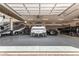 Oversized garage with an array of vehicles and storage, providing ample space and functionality at 38415 N 25Th Ave, Phoenix, AZ 85086