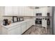 Bright kitchen with white cabinets, stainless steel appliances, and lots of counter space at 38415 N 25Th Ave, Phoenix, AZ 85086