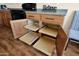 Kitchen cabinets with pull-out shelves for easy storage at 42485 W Abbey Rd, Maricopa, AZ 85138