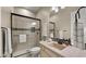 Bathroom featuring a glass-enclosed shower and a sink vanity with a neutral color scheme at 4341 E Evelyn St, Gilbert, AZ 85295