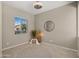 Cozy bedroom featuring a round accent rug, window and accent decor at 4341 E Evelyn St, Gilbert, AZ 85295