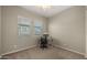Bright room with a desk and monitor setup, ideal for a home office or study area at 4341 E Evelyn St, Gilbert, AZ 85295