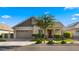 Charming single-Gathering home with well-manicured lawn, attractive landscaping, and a welcoming facade at 4341 E Evelyn St, Gilbert, AZ 85295