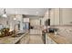 Bright kitchen featuring granite countertops, stainless steel appliances, and ample cabinet space at 4341 E Evelyn St, Gilbert, AZ 85295