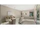 Bright and airy living space with a chandelier and access to the backyard at 4341 E Evelyn St, Gilbert, AZ 85295