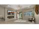 Living room with sliding glass door and modern fireplace at 4341 E Evelyn St, Gilbert, AZ 85295