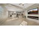 Spacious open-concept living area with modern fireplace and large windows for natural light at 4341 E Evelyn St, Gilbert, AZ 85295
