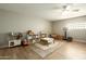 Spacious playroom featuring storage, toys, fan, and natural light at 547 W Orangewood Ave, Phoenix, AZ 85021