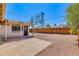 The spacious backyard has a stone surface and a covered patio area at 6040 N 31St Dr, Phoenix, AZ 85017