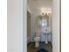 A quaint bathroom featuring a toilet, sink, and combined shower and tub at 6040 N 31St Dr, Phoenix, AZ 85017