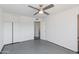 The bedroom features a ceiling fan, tile floors, and large closet for plenty of storage at 6040 N 31St Dr, Phoenix, AZ 85017