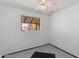 A bedroom with a ceiling fan and a window with a view of the outdoors at 6040 N 31St Dr, Phoenix, AZ 85017