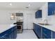 The kitchen has ample counter space, plenty of cabinets, and stainless steel appliances at 6040 N 31St Dr, Phoenix, AZ 85017