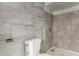 Clean, modern bathroom features stylish tiling and a sleek shower setup at 6063 W Earll Dr, Phoenix, AZ 85033